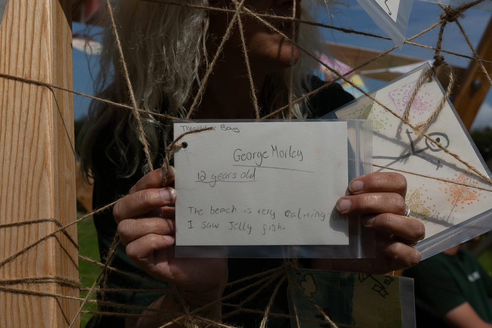 Back of postcard by , age 