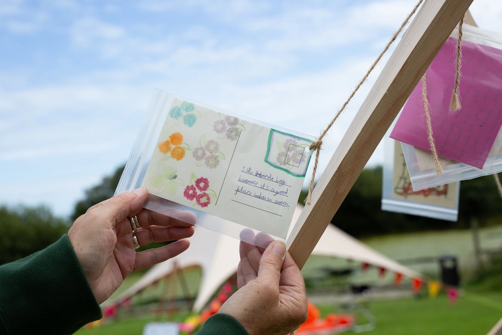 Back of postcard by , age 