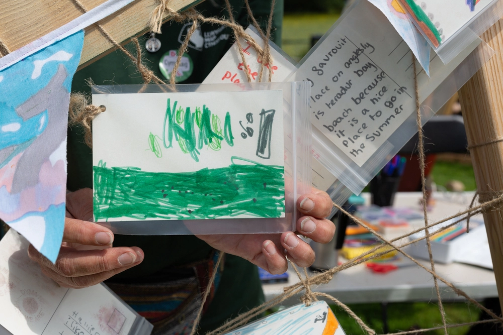 Front of postcard by , age 