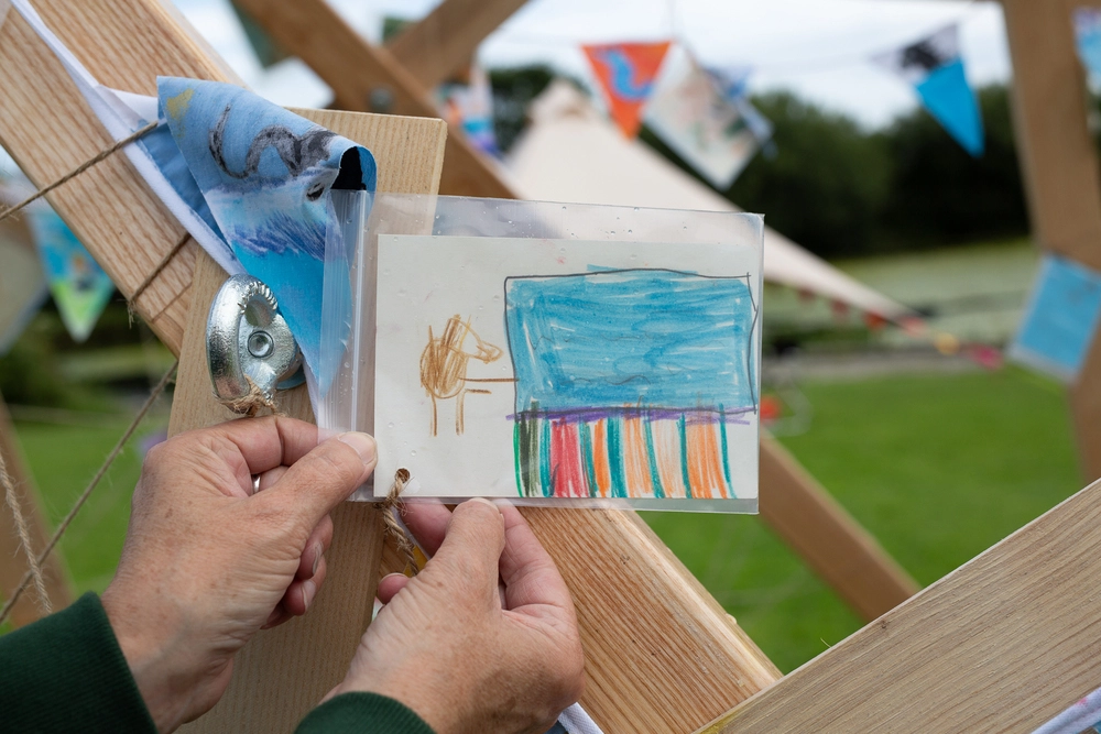 Front of postcard by , age 