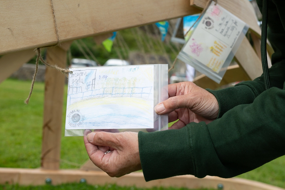 Back of postcard by , age 