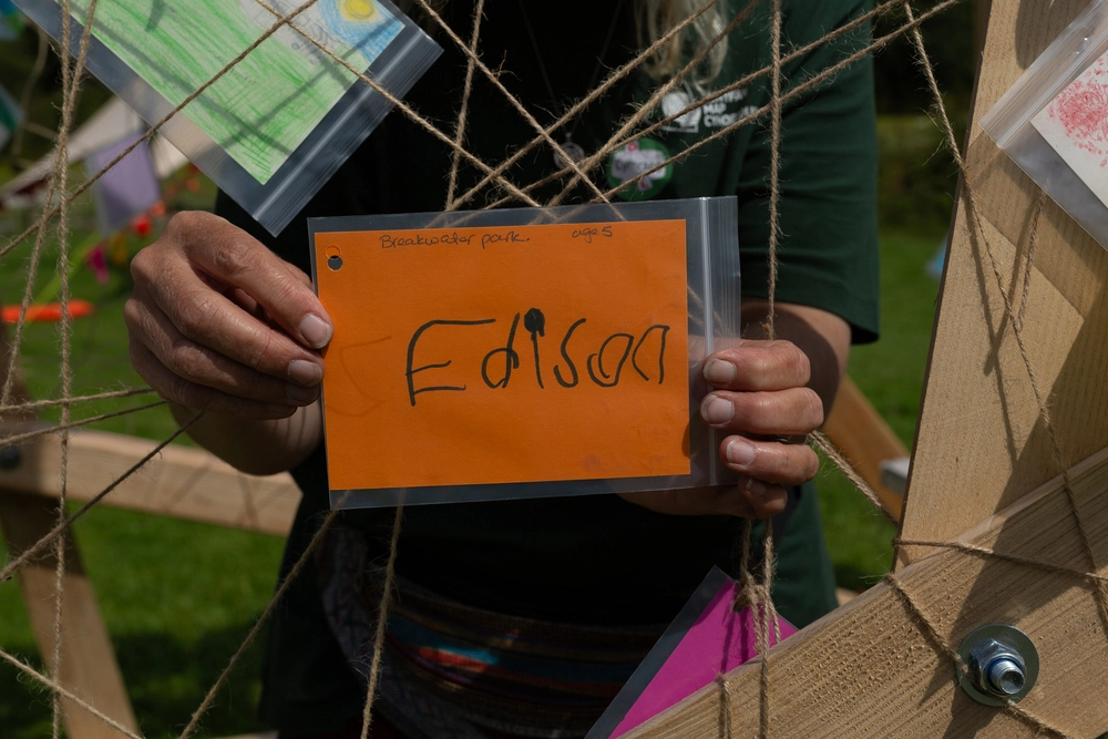 Back of postcard by , age 