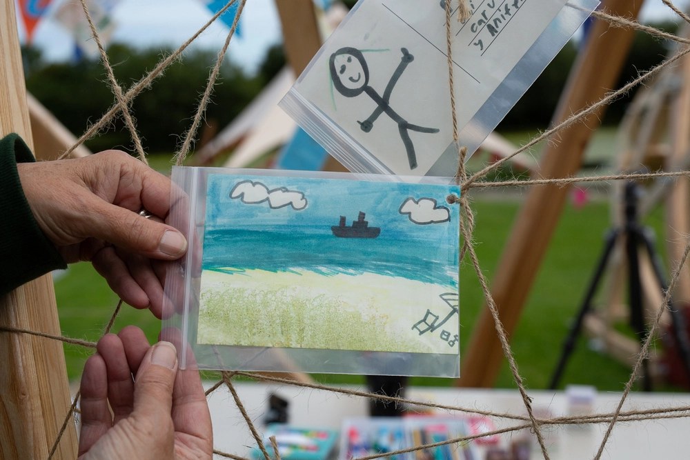 Front of postcard by , age 