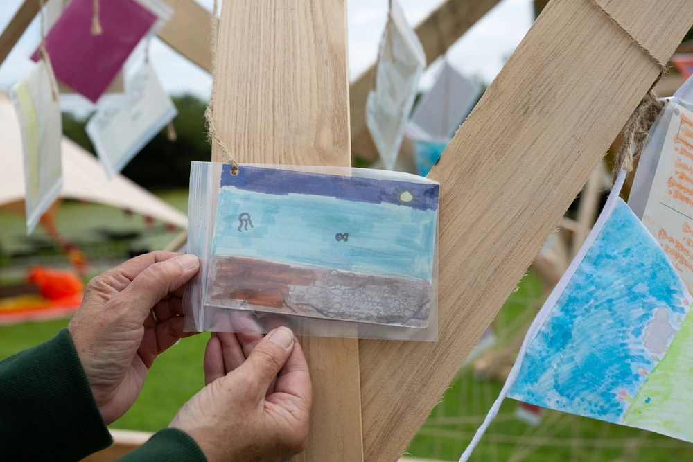 Front of postcard by , age 