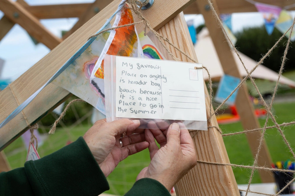 Back of postcard by , age 