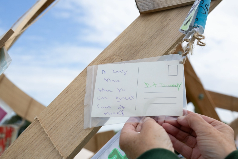 Back of postcard by , age 