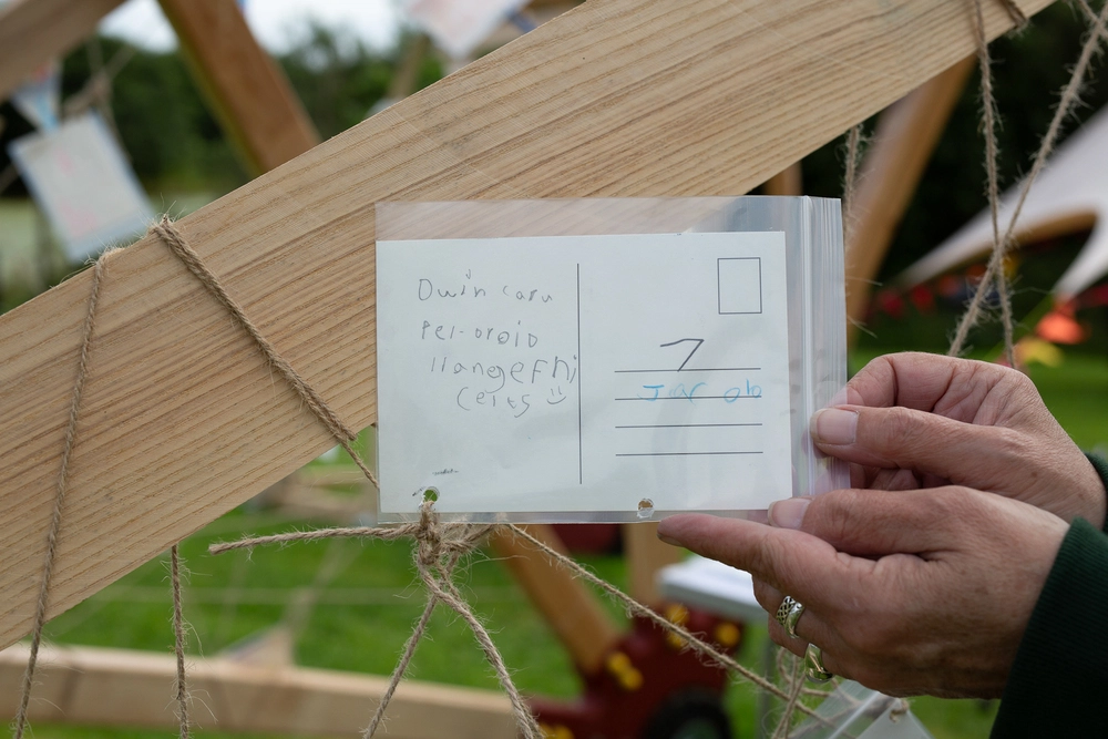 Back of postcard by , age 