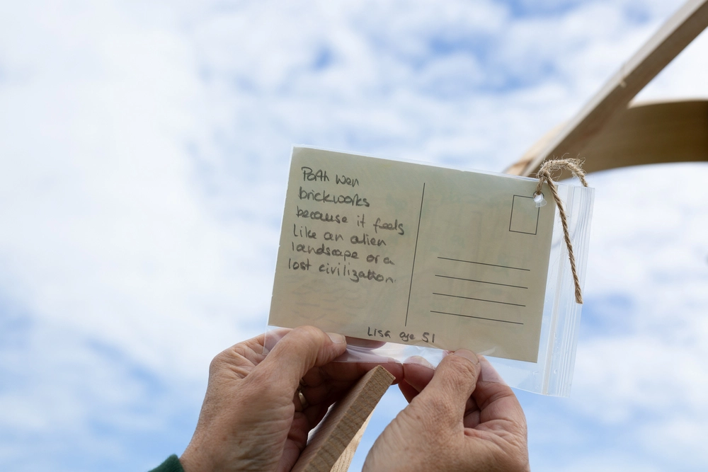 Back of postcard by , age 