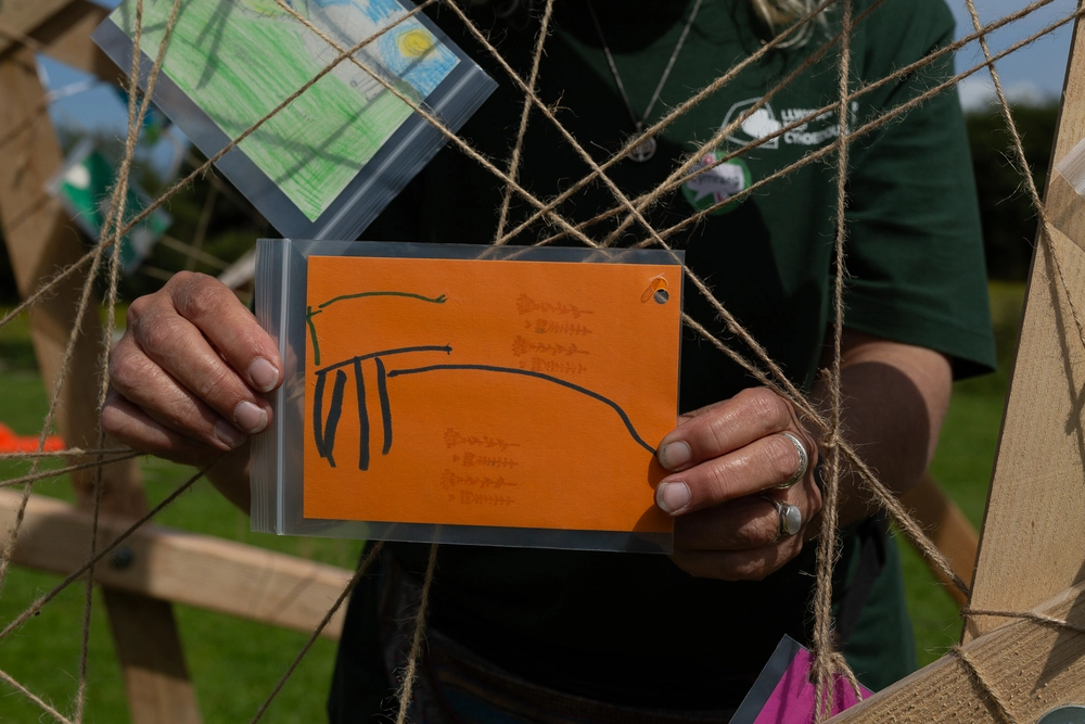 Front of postcard by , age 