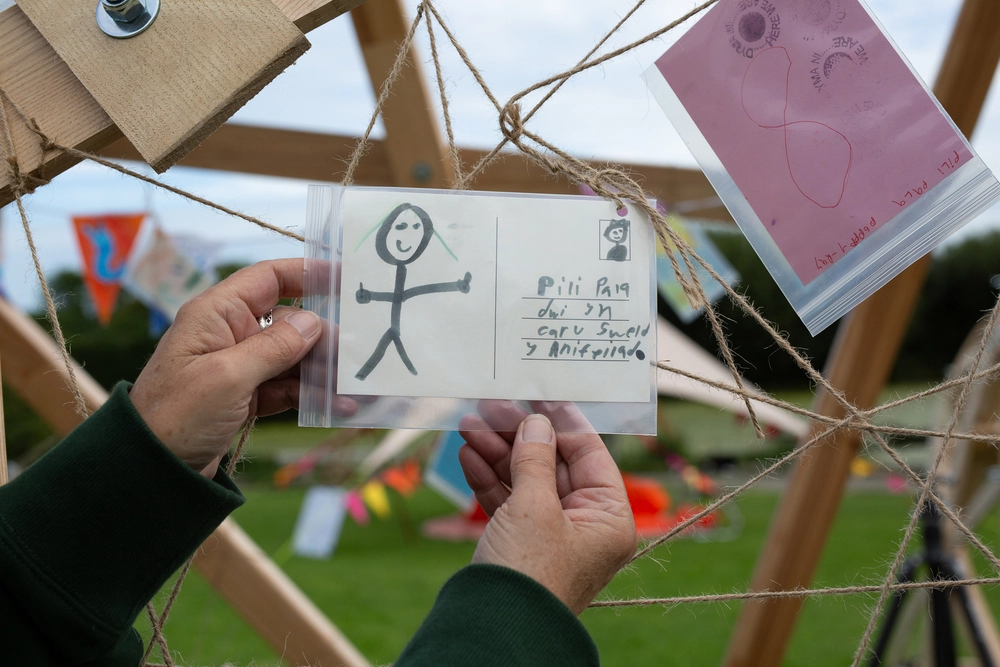 Back of postcard by , age 