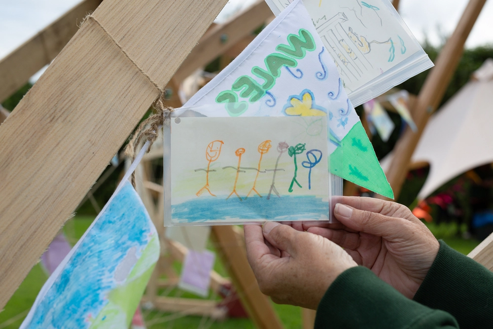 Front of postcard by , age 