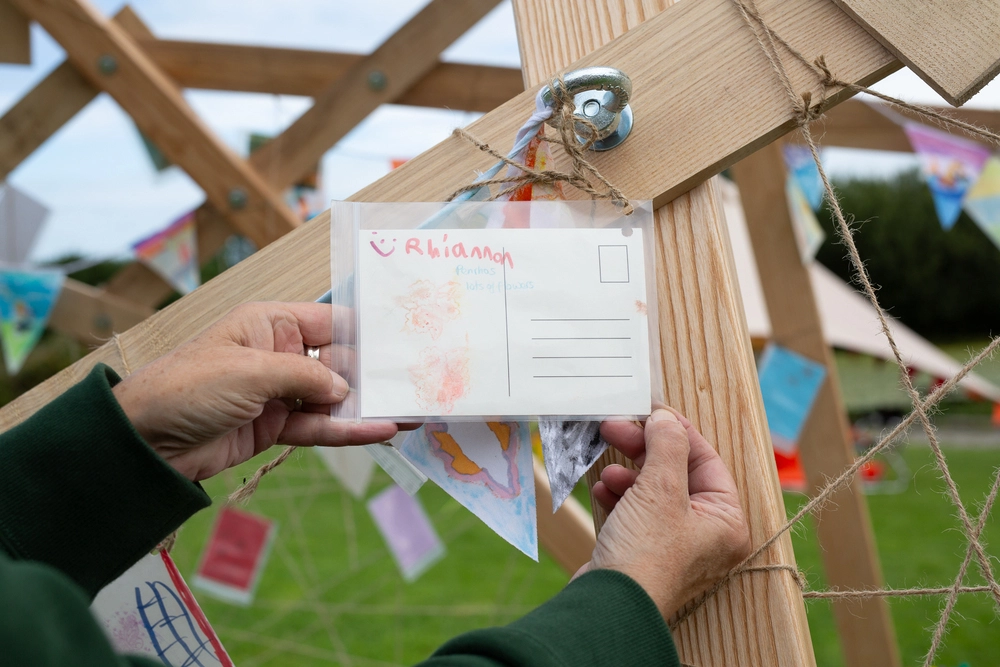 Back of postcard by , age 