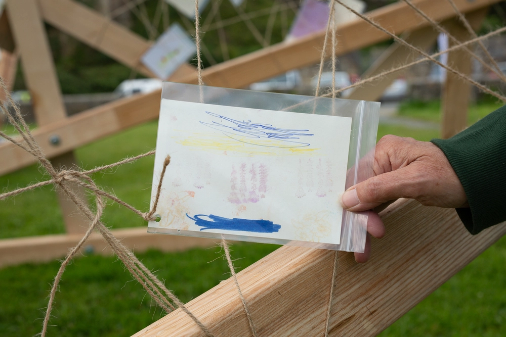 Front of postcard by , age 