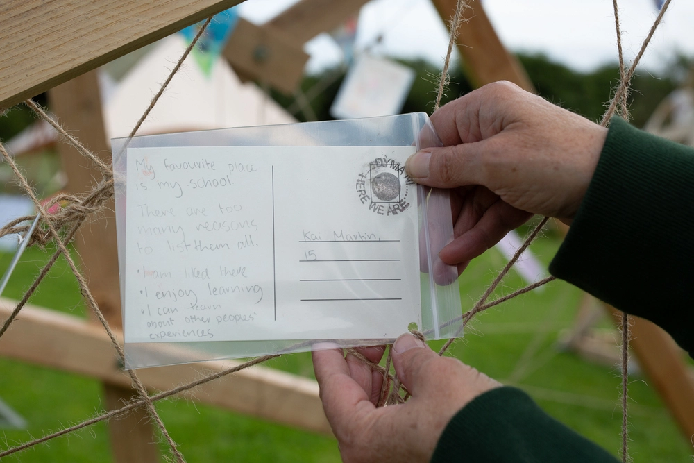 Back of postcard by , age 