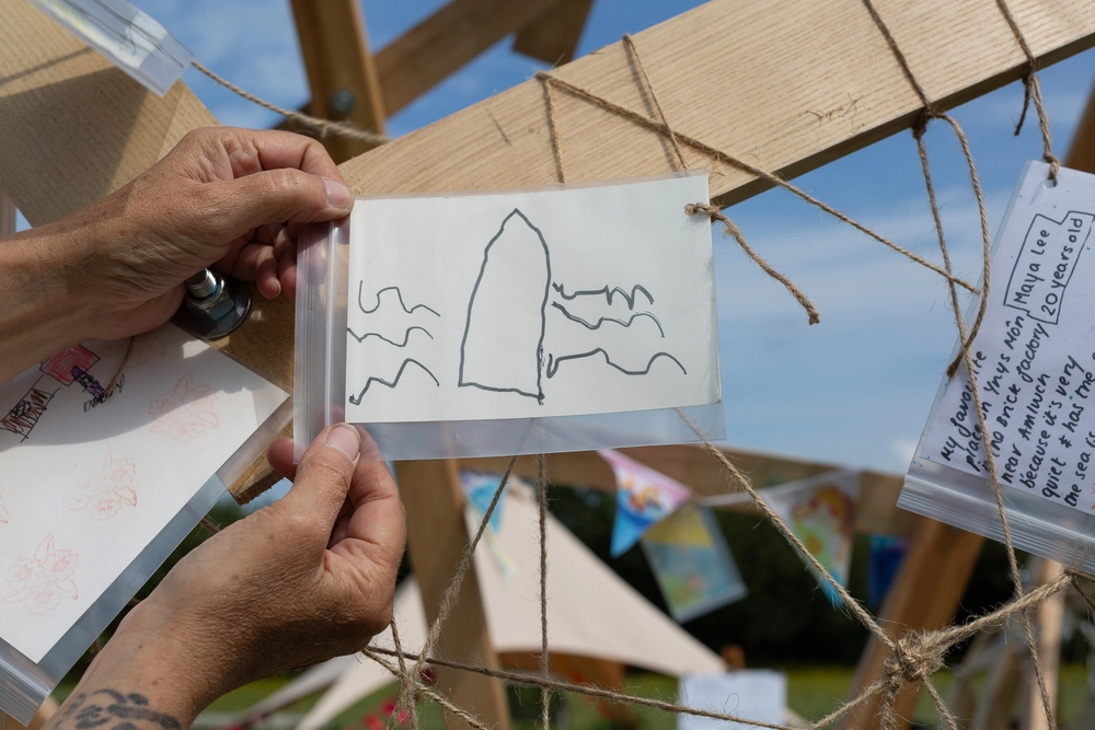 Front of postcard by , age 