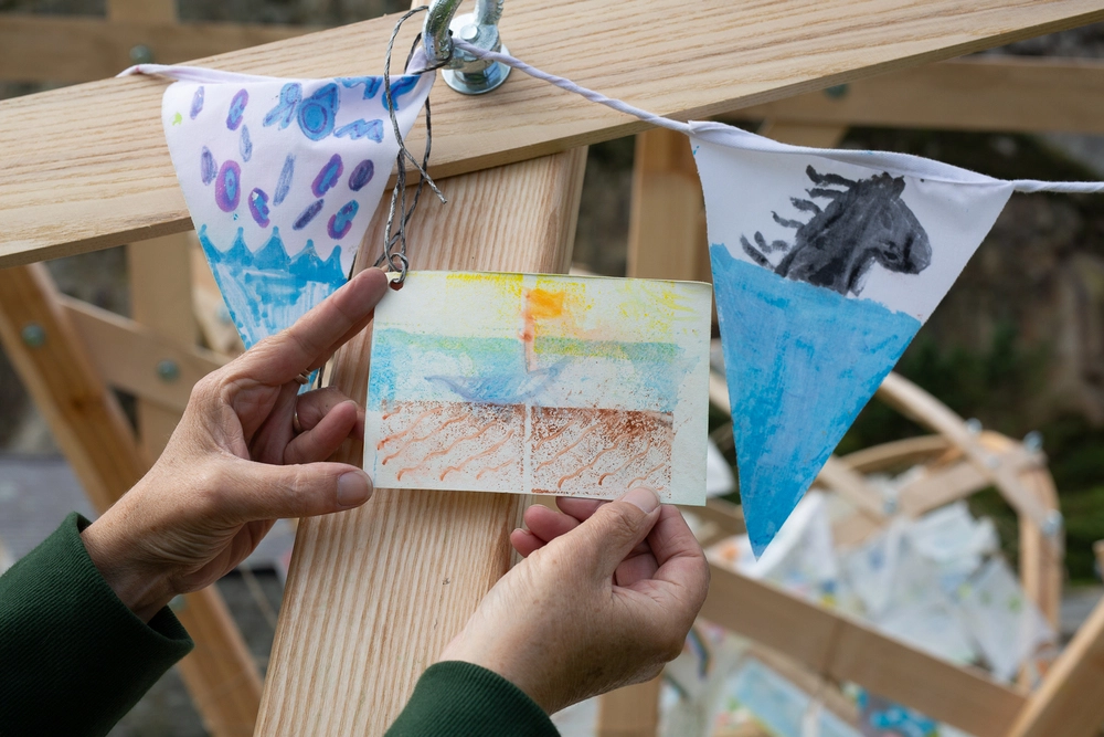 Front of postcard by , age 