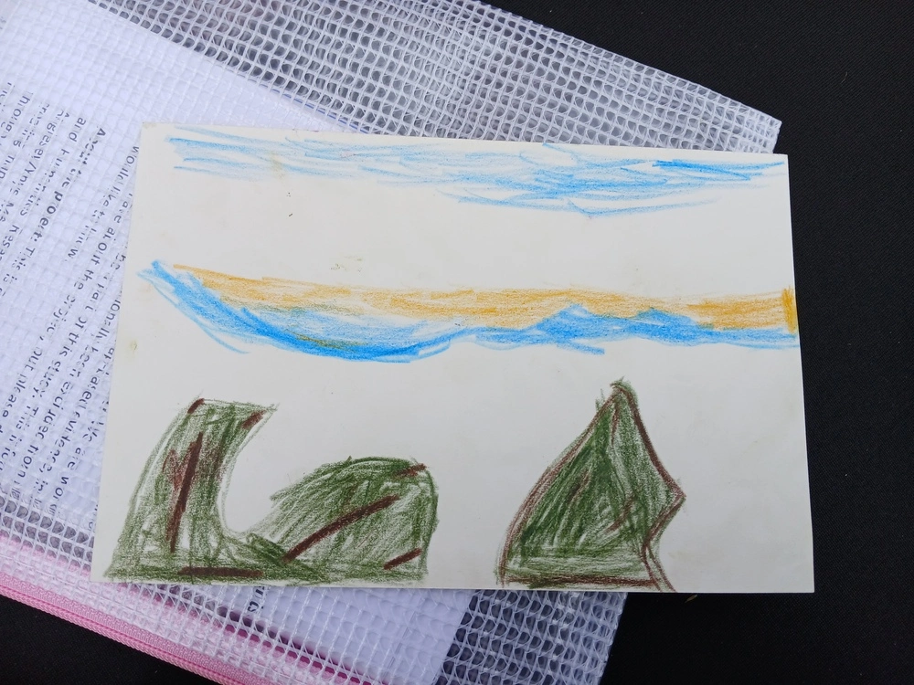 Back of postcard by , age 