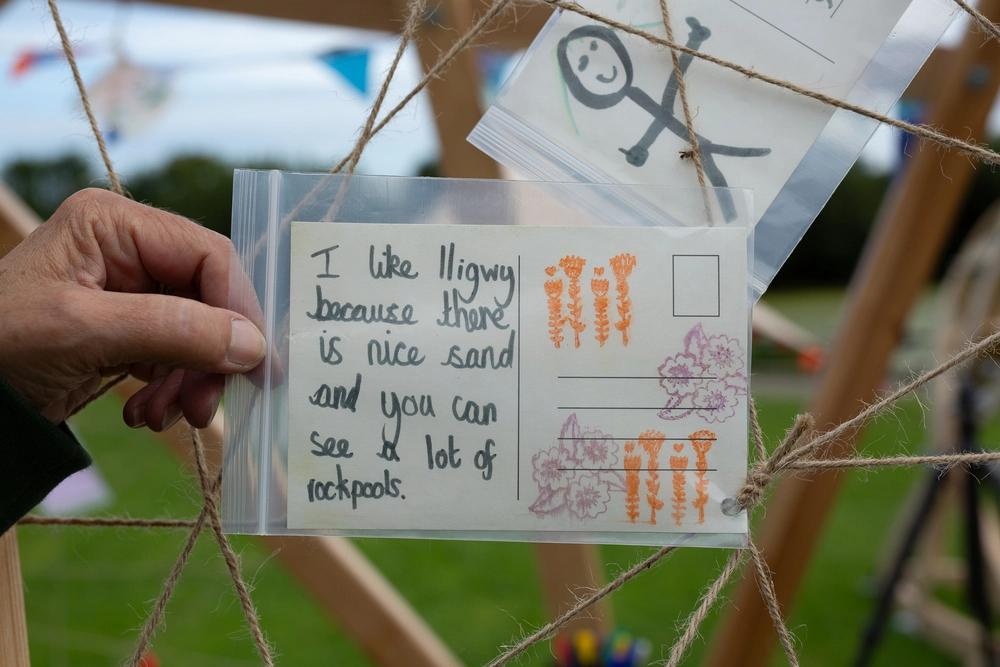 Back of postcard by , age 