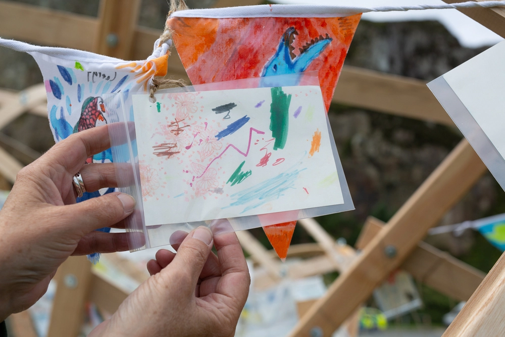 Front of postcard by , age 