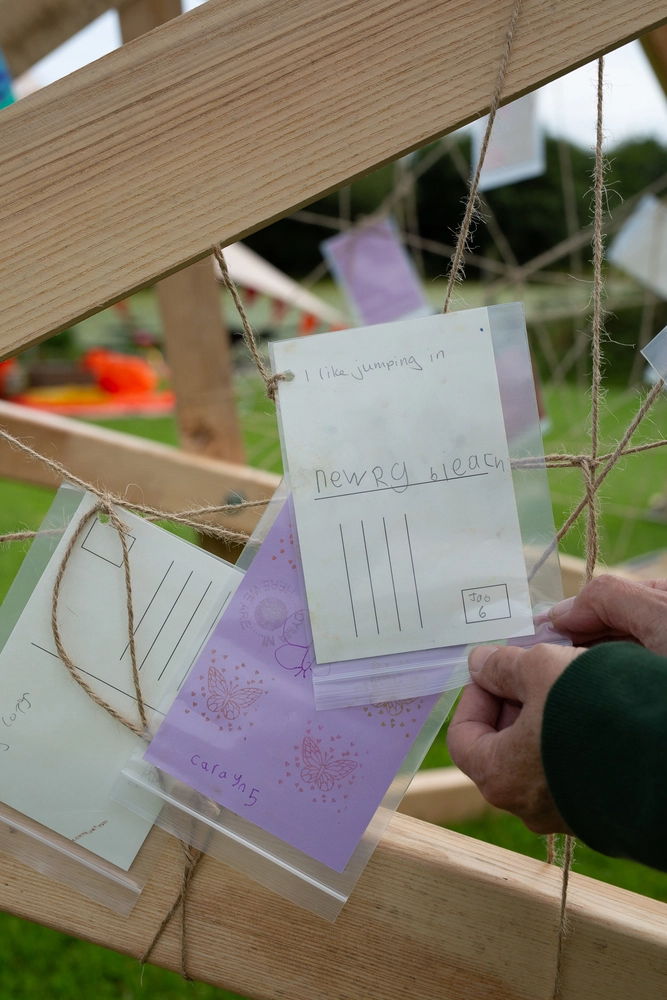 Back of postcard by , age 