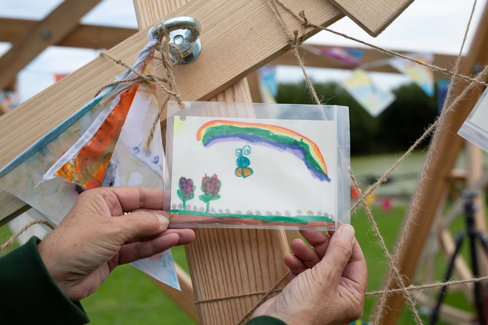 Front of postcard by , age 