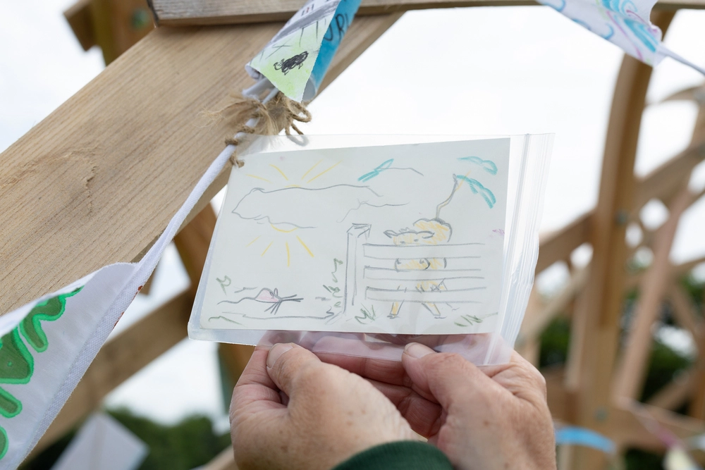 Front of postcard by , age 