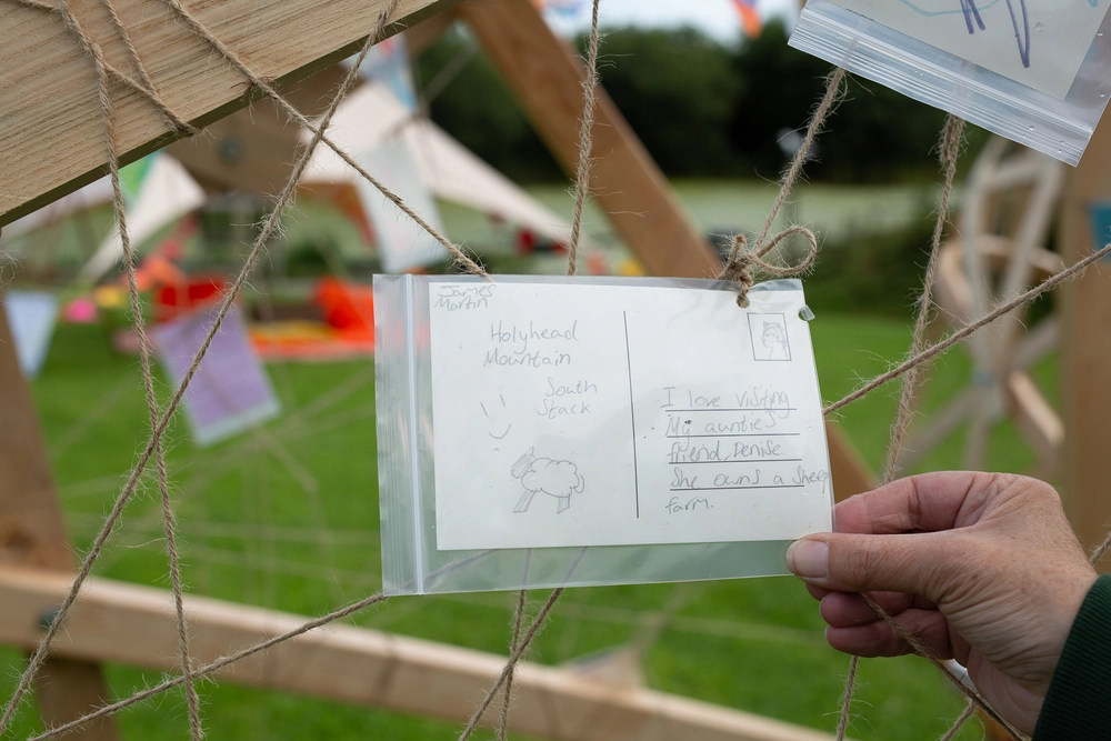 Back of postcard by , age 