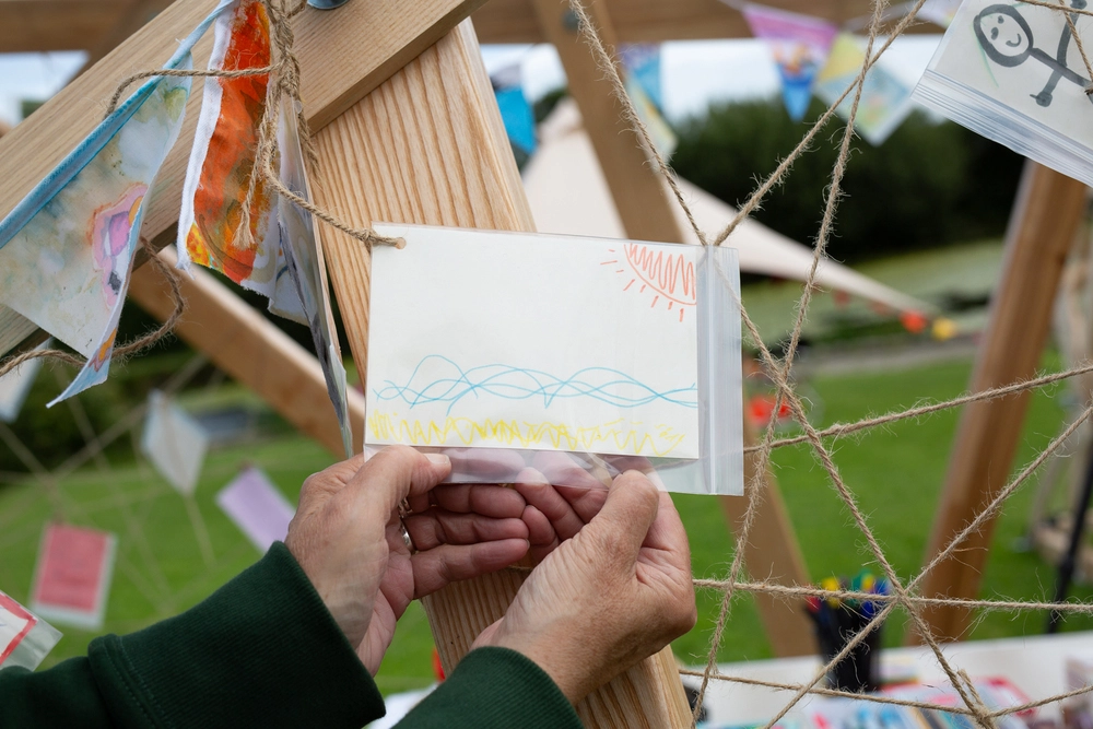 Front of postcard by , age 