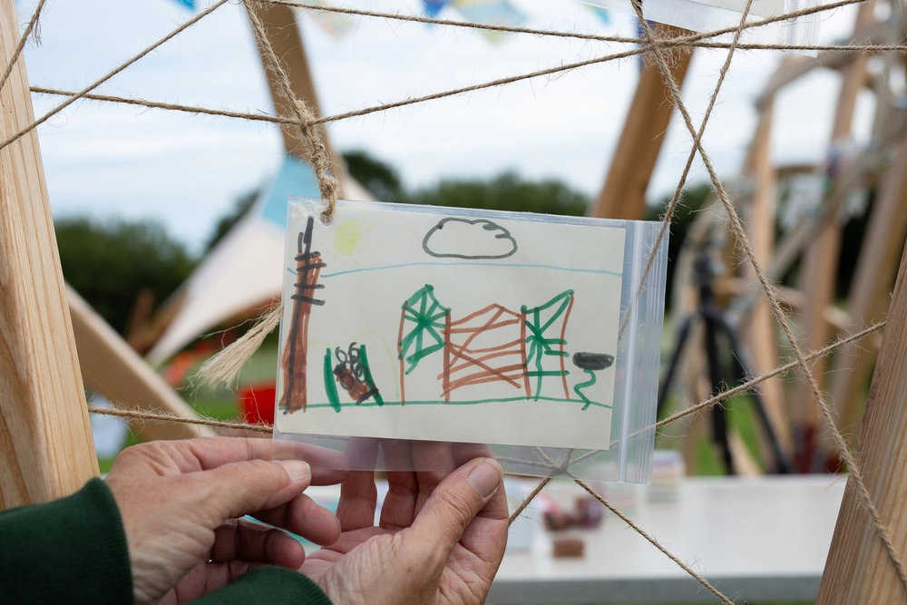 Front of postcard by , age 