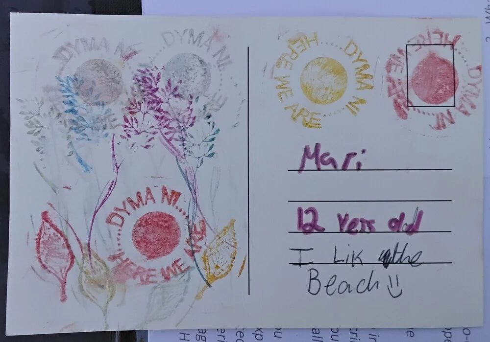 Back of postcard by , age 