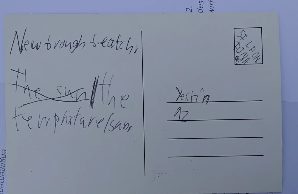 Back of postcard by , age 