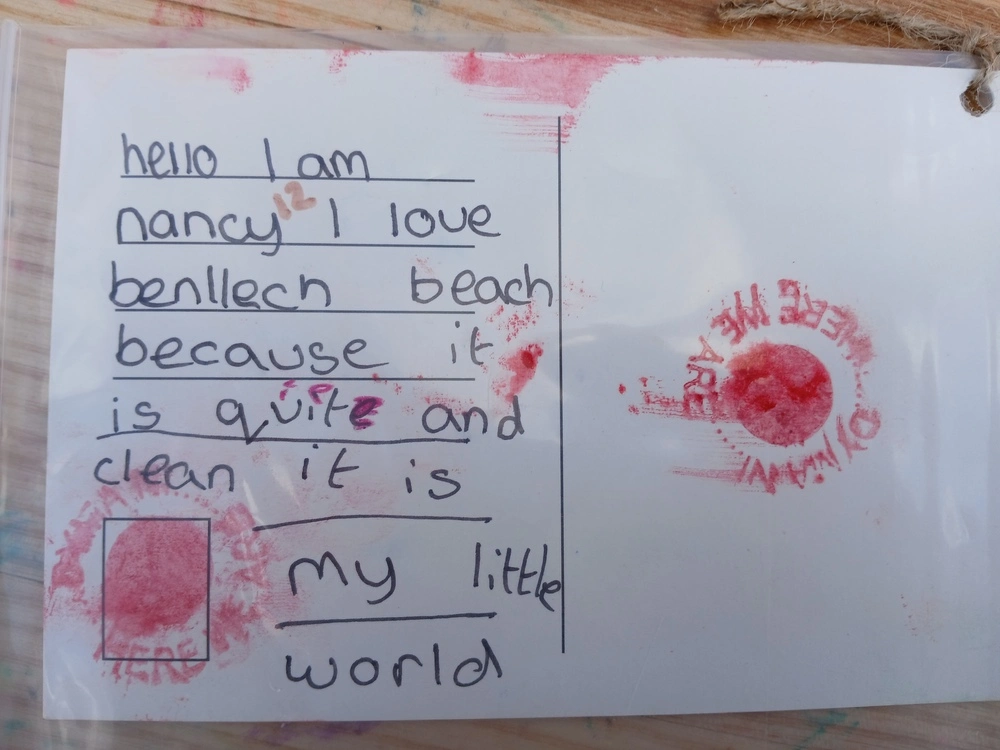 Back of postcard by , age 