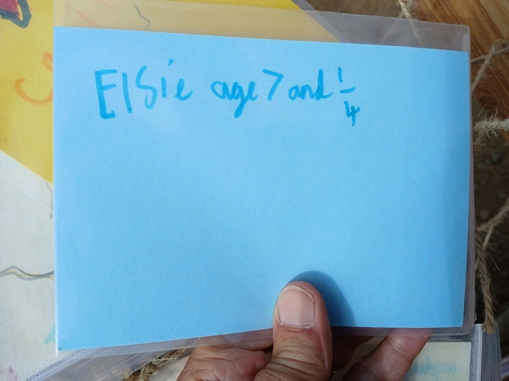 Back of postcard by , age 