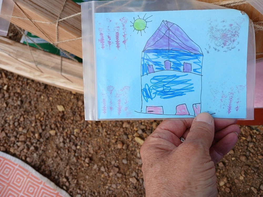 Front of postcard by , age 