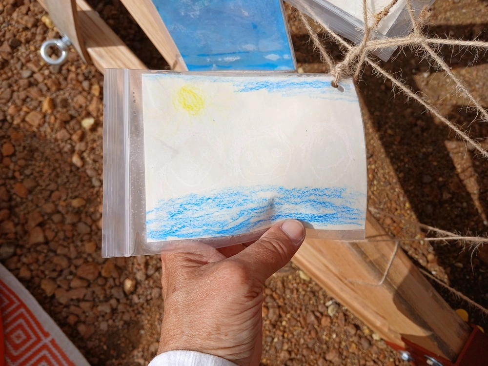 Front of postcard by , age 